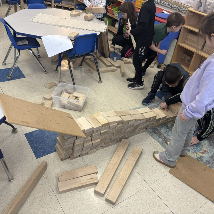 students building with blocks