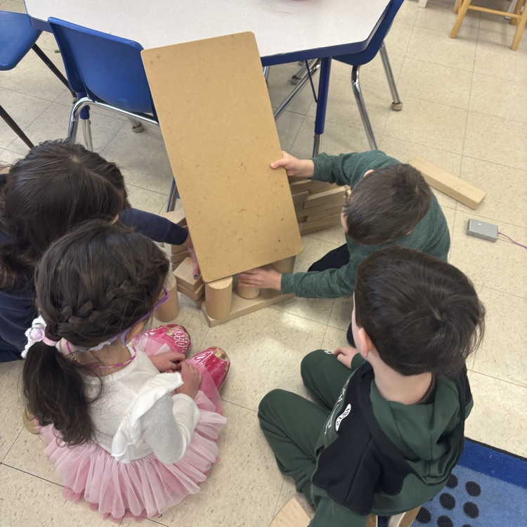 students building with blocks