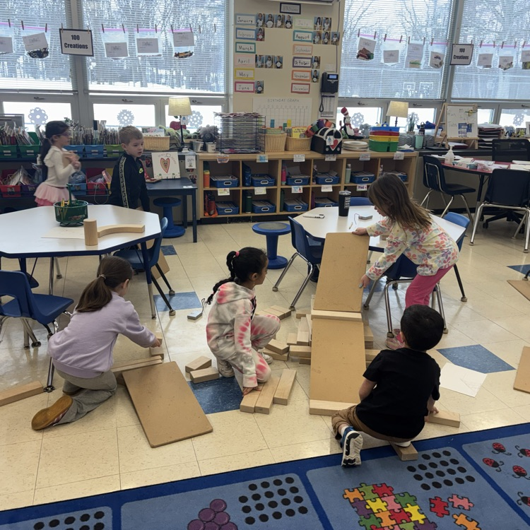 students building with blocks