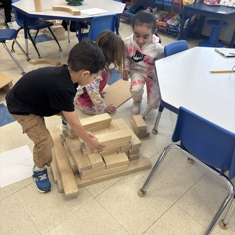 students building with clocks