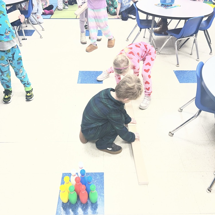 KRO used what they know about force and motion to knock down pins in bowling. they even built bumpers to help their aim.