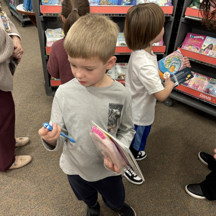 children shopping for books