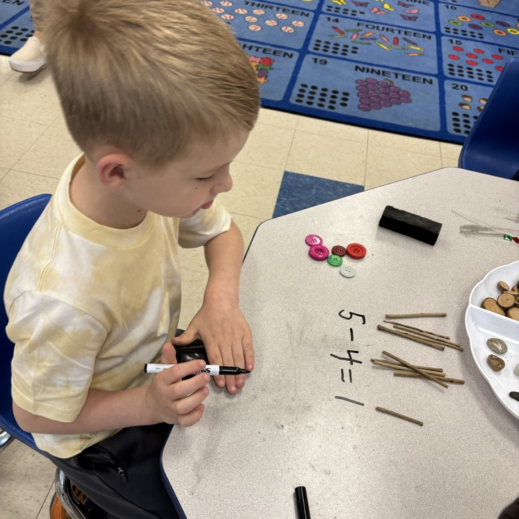 boy working on math problems