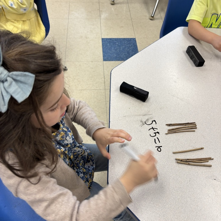 girl working on math problems