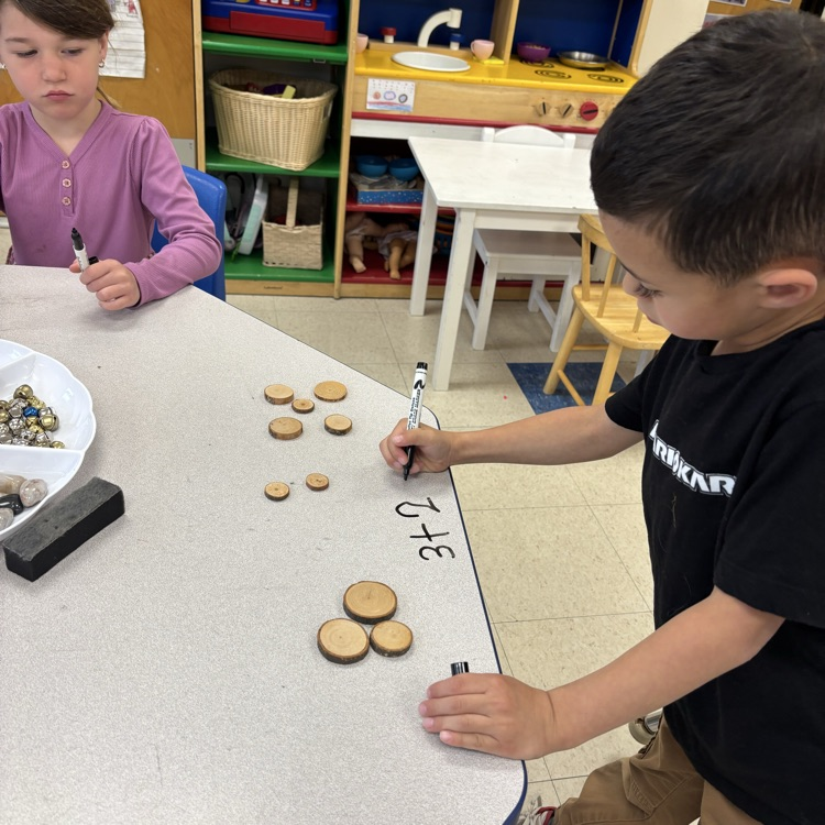 boy, working on math problem