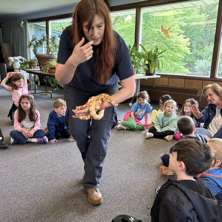 Woman holding a snake