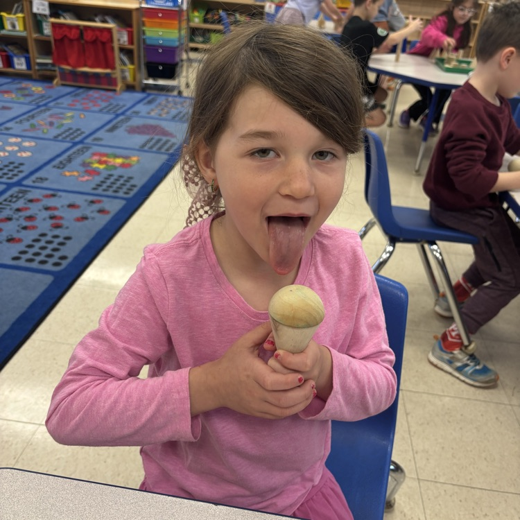 girl, pretending to lick an ice cream cone