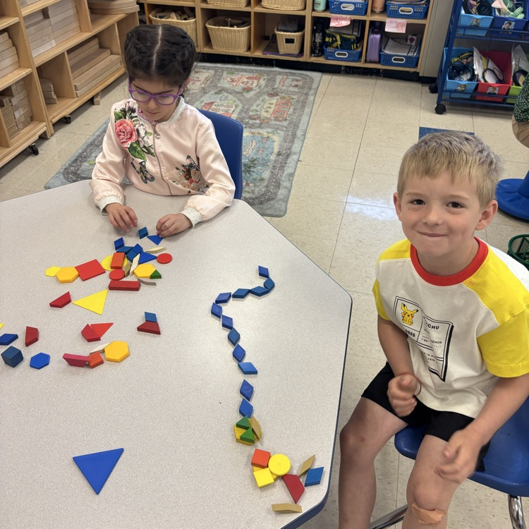 students making pictures with shape