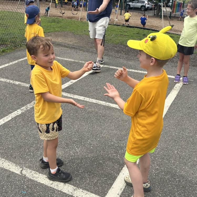 boys playing rock paper scissors