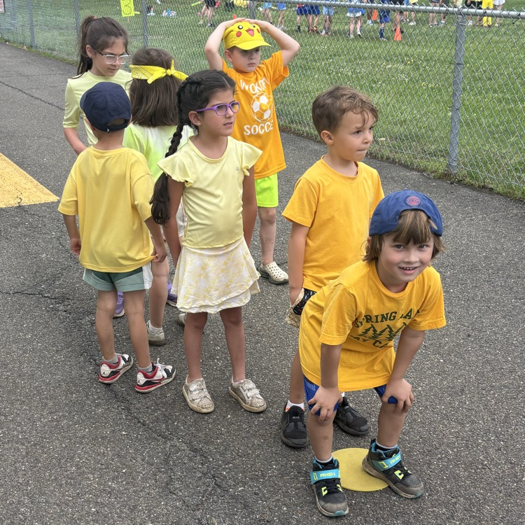 children dressed in yellow