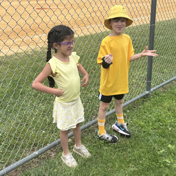children dressed in yellow