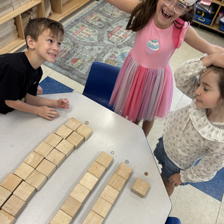 students using blocks to represent
