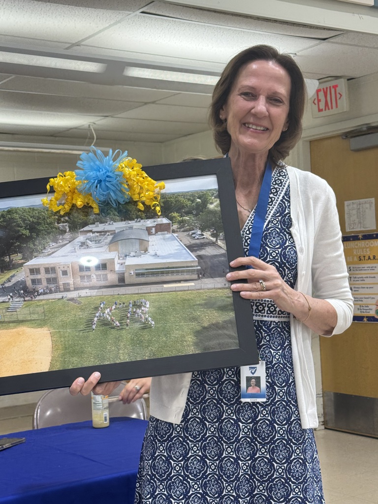 teacher holding gift