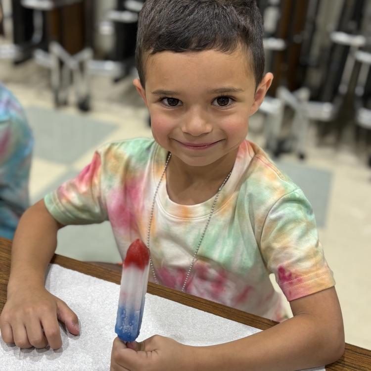 Little boy, eating an ice pop
