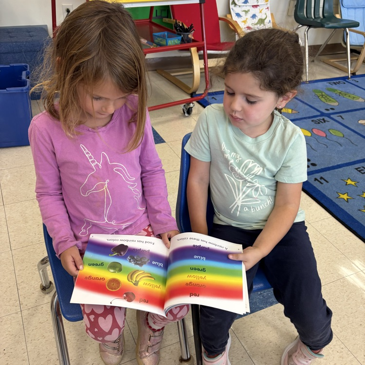 girls reading together