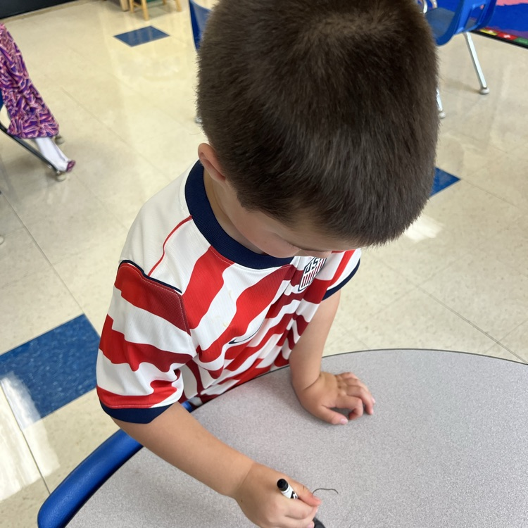 KR sang an alphabet song and practiced "trace and erase" when we got to the letters in their names. 