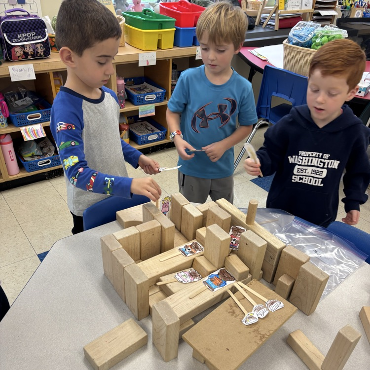 children building with blocks