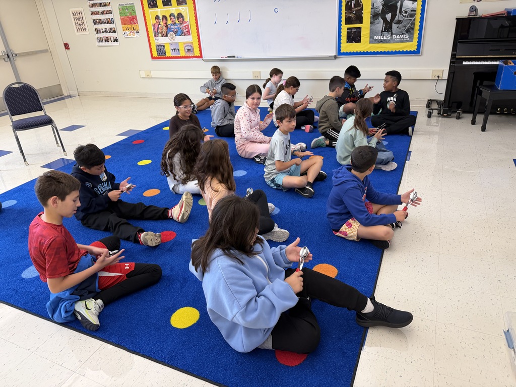 students playing musical spoons 