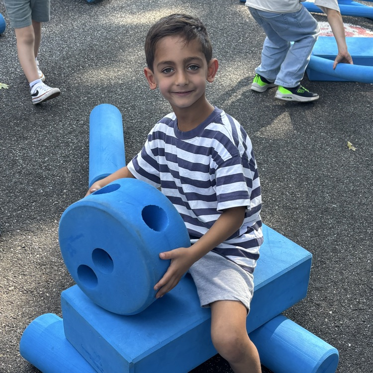 boy playing with blocks