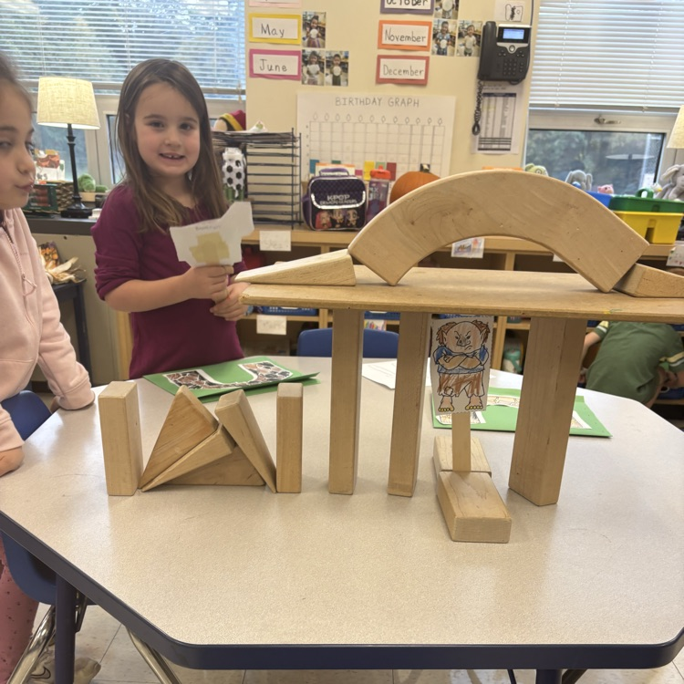 be telling the three Billy goats Gruff using blocks