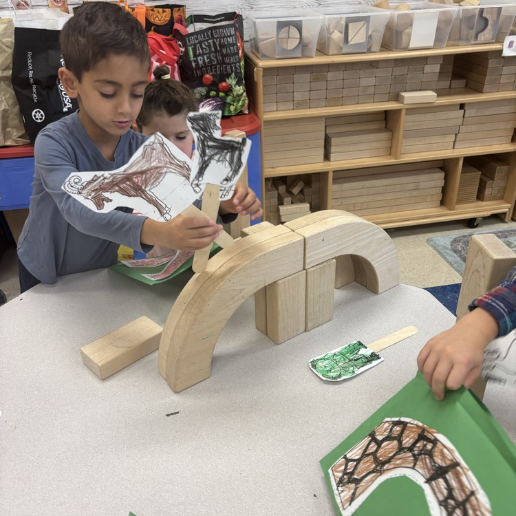building a bridge and using puppets to