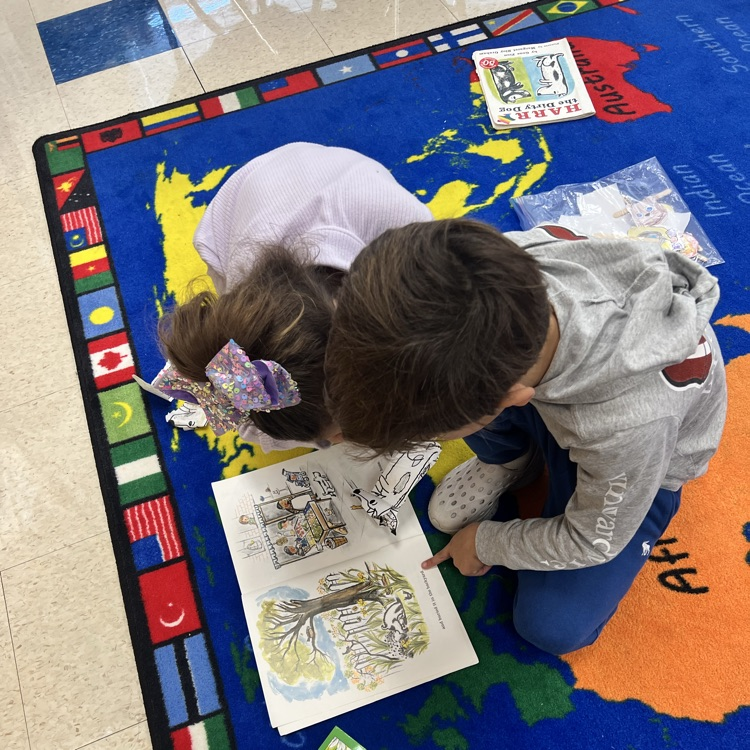 KR practices retelling Star Books with partners during Reading Workshop
