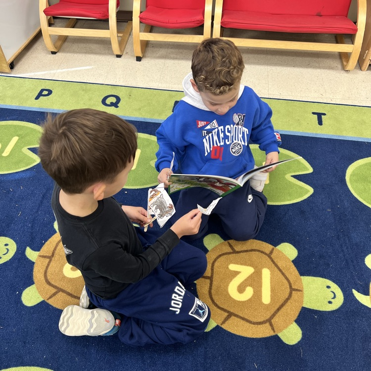KR practices retelling Star Books with partners during Reading Workshop