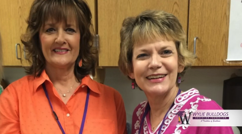 2 Teachers poseing for photo