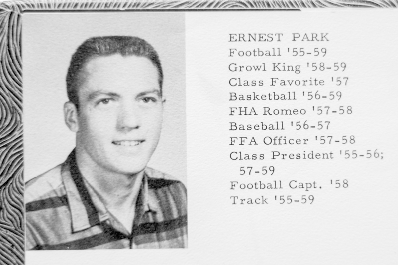 Black-and-white yearbook portrait of Ernest Park with a list of his high school activities and honors, including football, basketball, track, class president, and team captain.