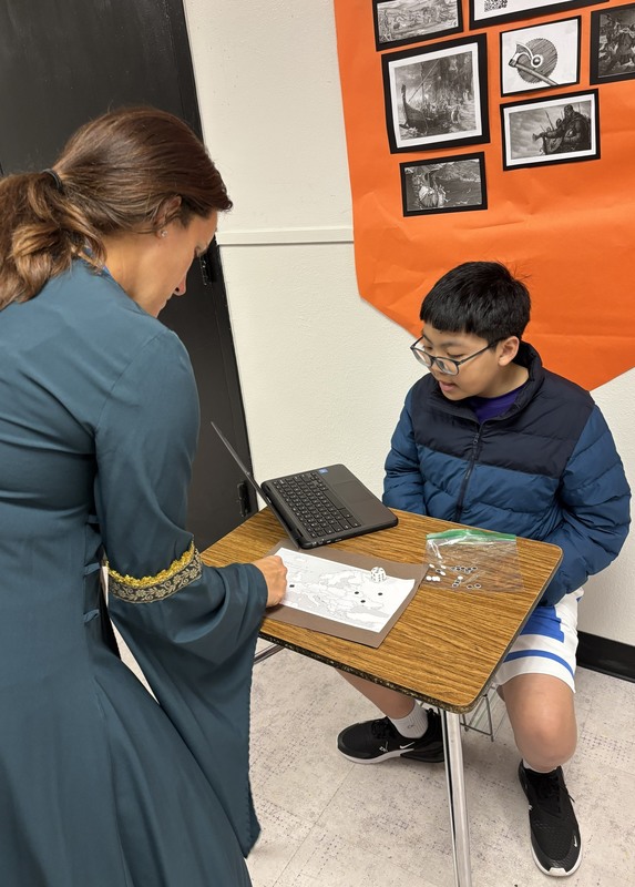 Ann Hurst and student Bao Tran raid and pillage as the Vikings did back in the day.