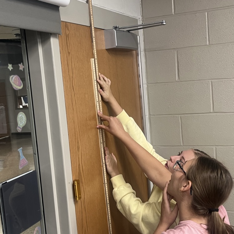 Physical science students perform their first lab of the year.