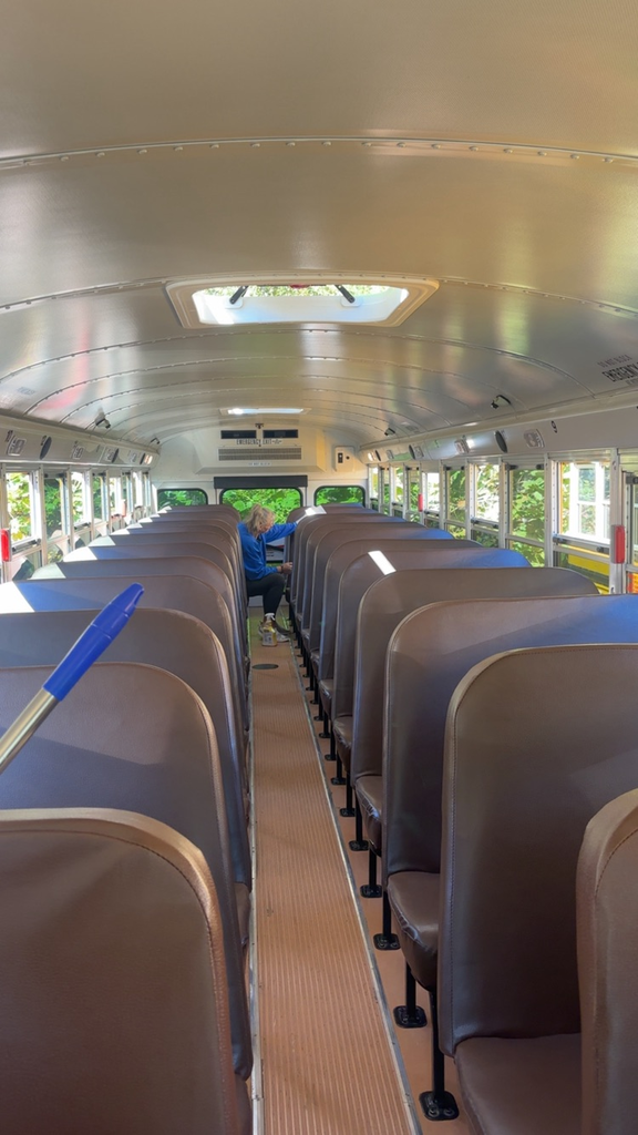 Bus driver is cleaning