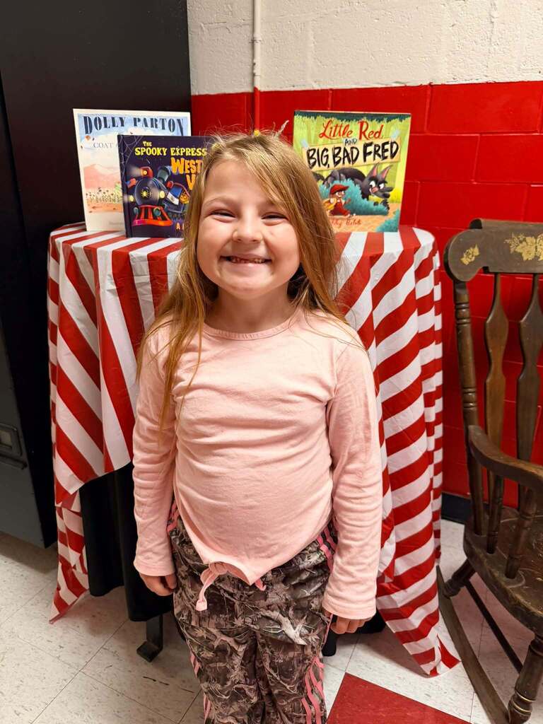  Journey Hurley smilling in front of the "Reading Corner"