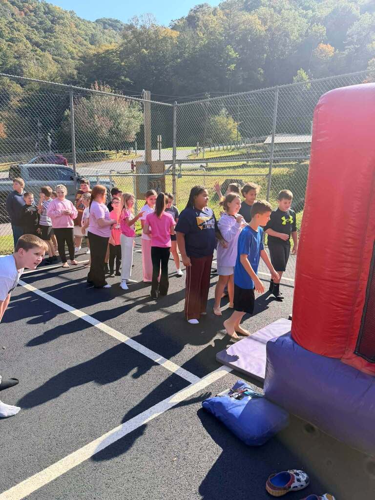 4th Grade students lined up for the inflatable obstical course.