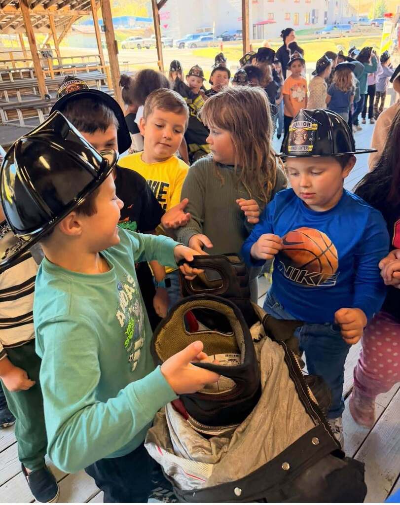 students examining gear