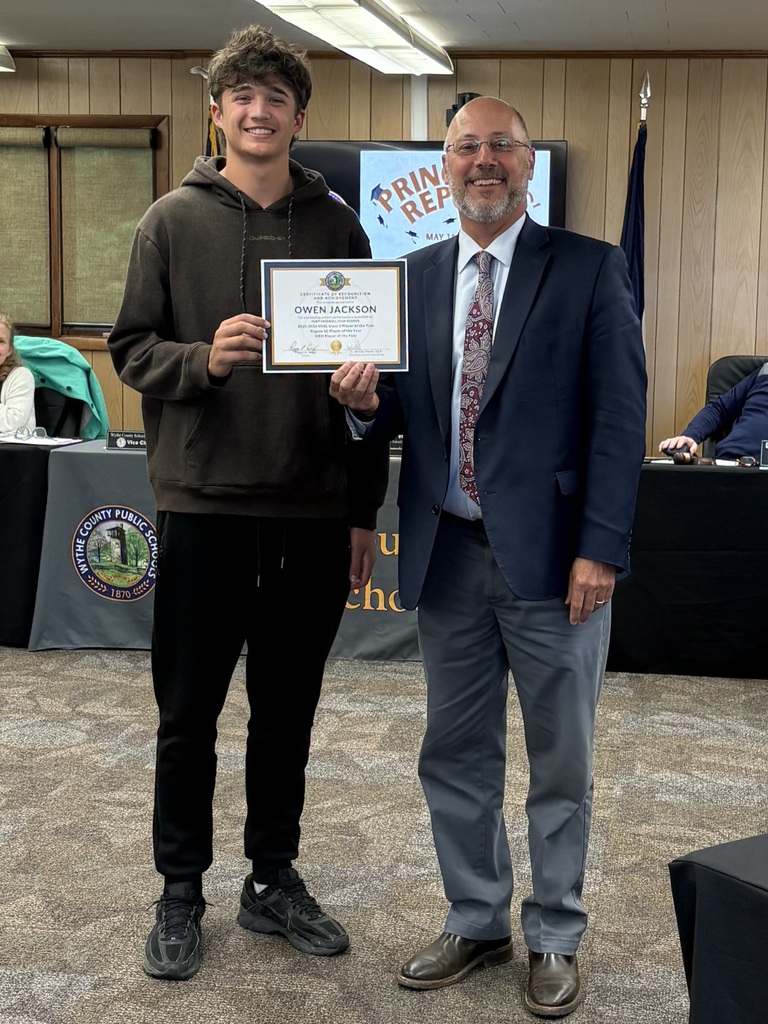 FCHS Student Owen Jackson accepting award from Superintendent Dr. Wesley Poole