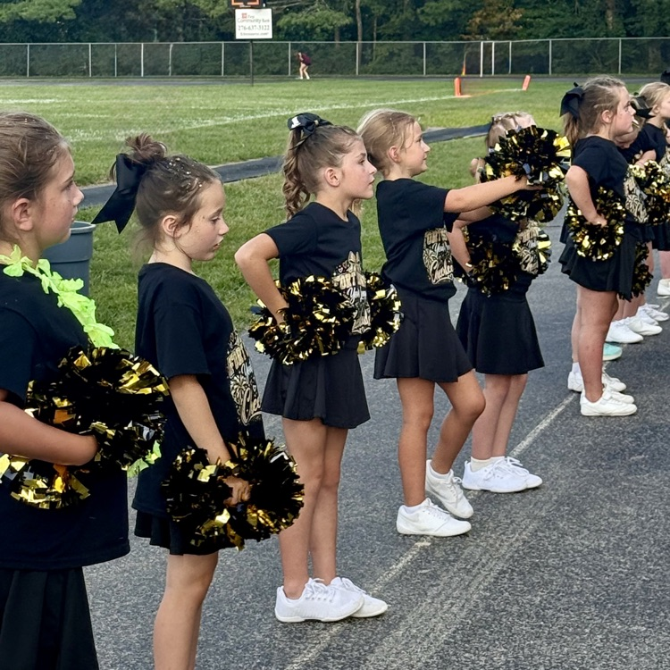 Sandlot night brought the elementary girl cheerleaders to join the high school cheerleaders!