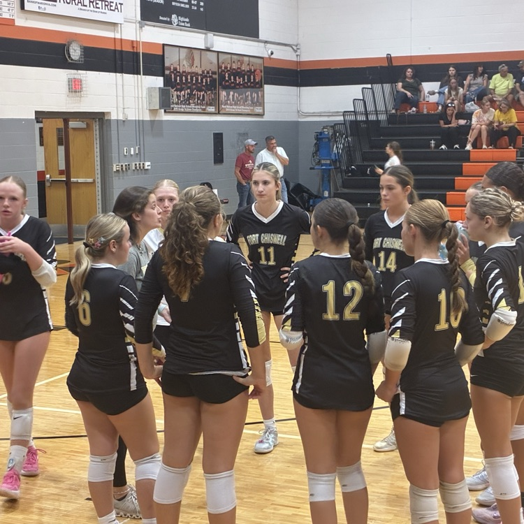 The girls huddle up in a quick timeout.