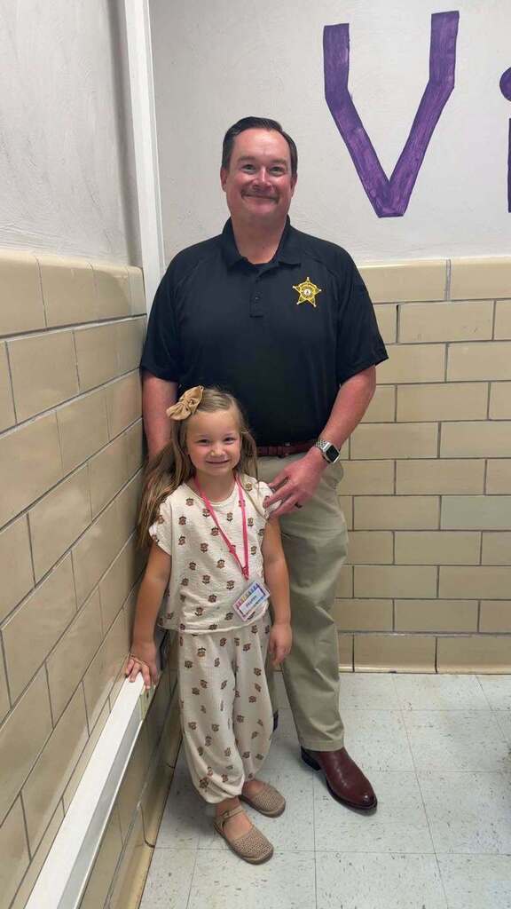 Mr. Vaught with student.
