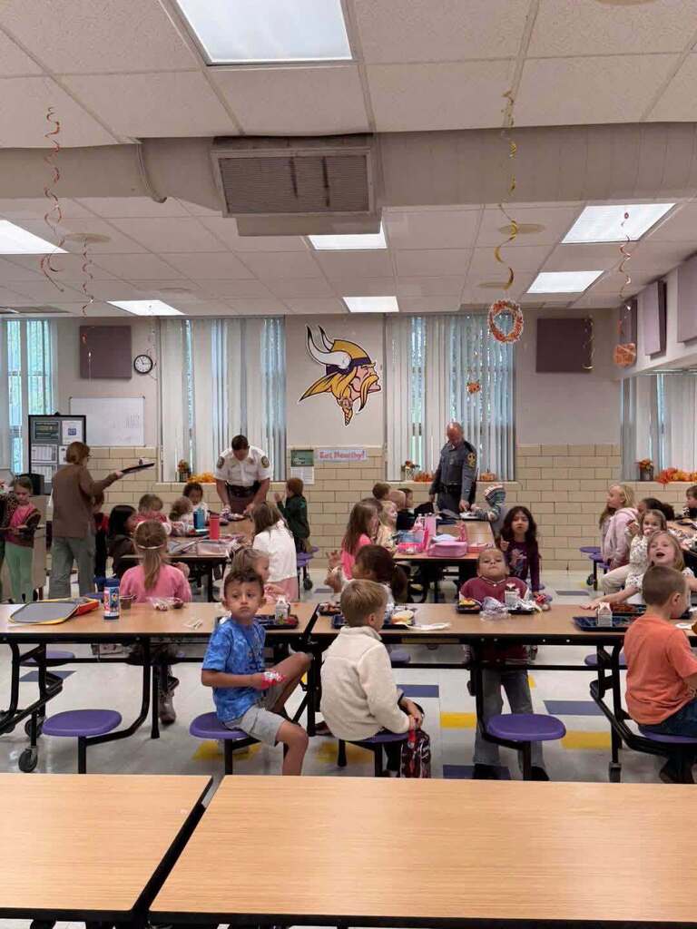Students in lunch room.