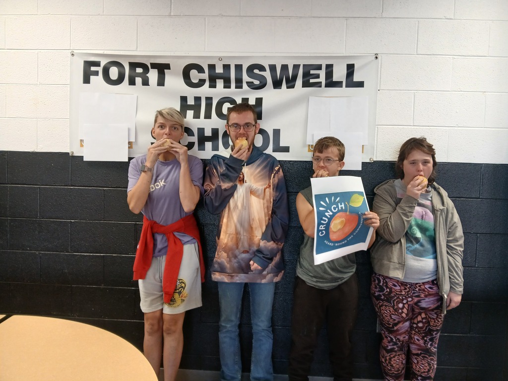FCHS Students biting their apples