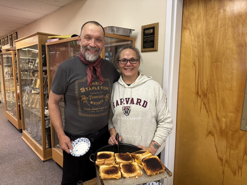 Cynthia and Greg making and servicing Potato Chowder, Grilled Cheese, and homemade croutons.