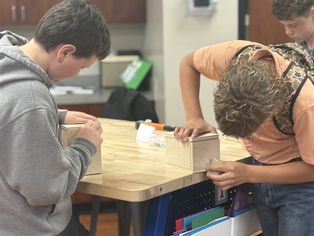 Students building a box