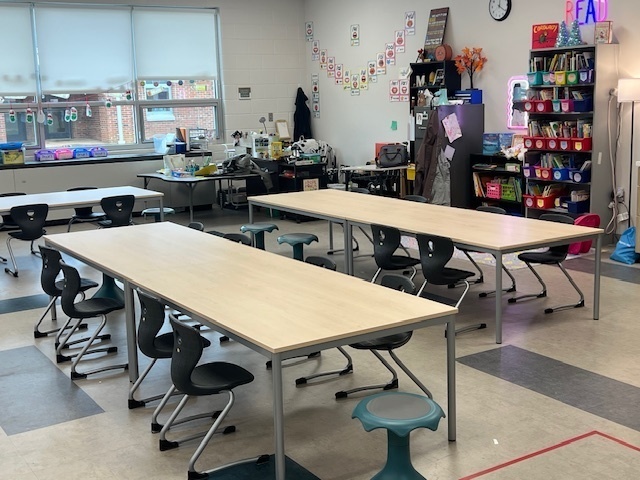 table and chairs in a classrrom