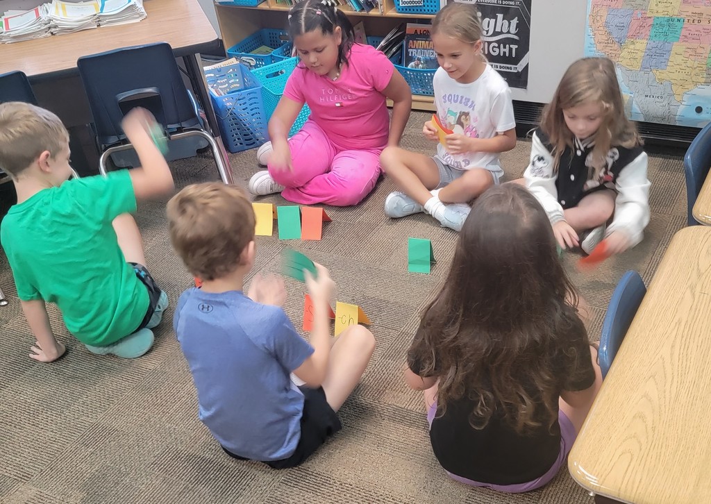 students practicing sounds 