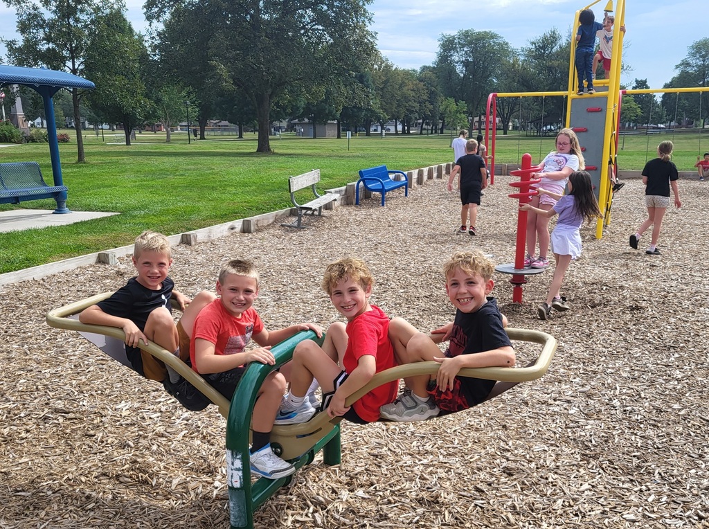 4 boys on seesaw