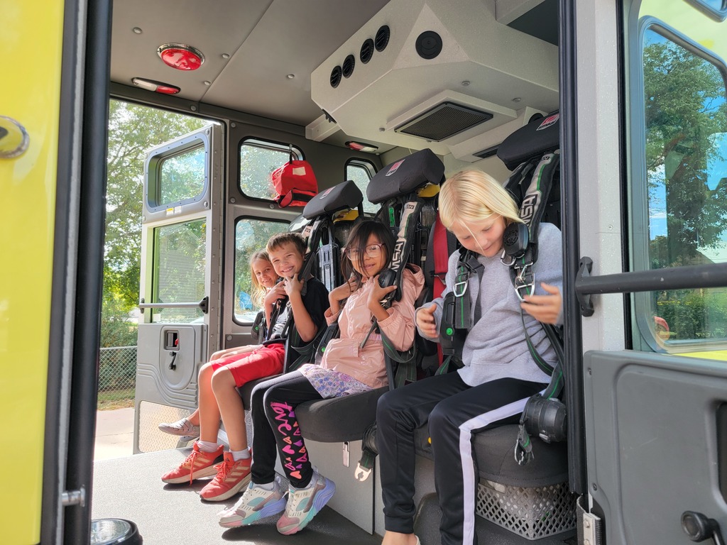 students in fire truck