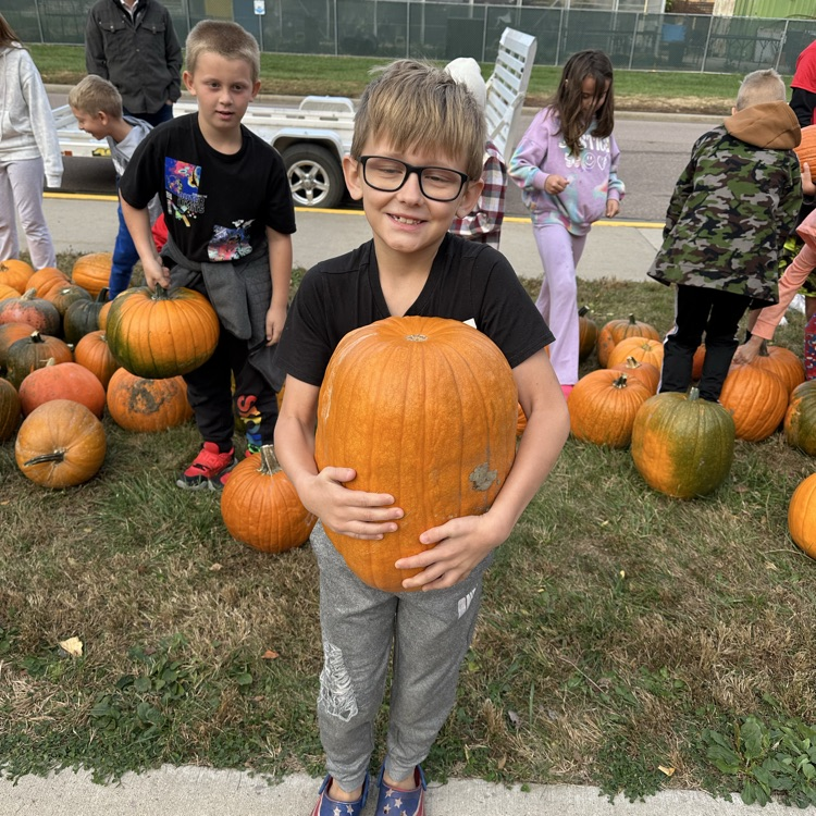 kids with pumpkins