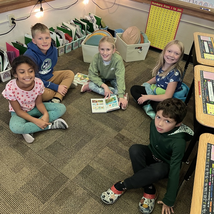 Mrs. Vlasman's Beadle 2nd graders love reading with 5th grade friends.