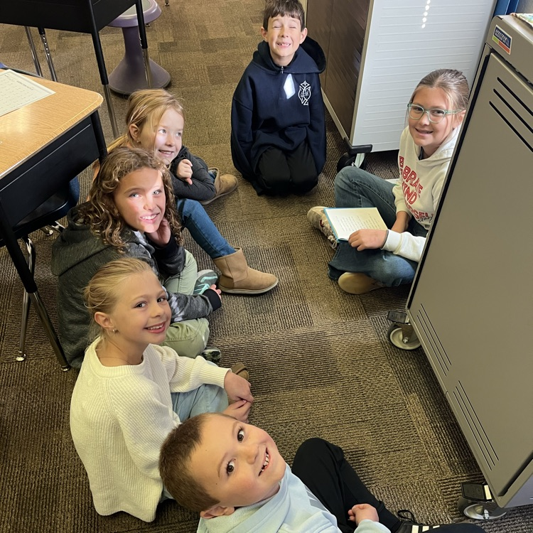 Mrs. Vlasman's Beadle 2nd graders love reading with 5th grade friends.